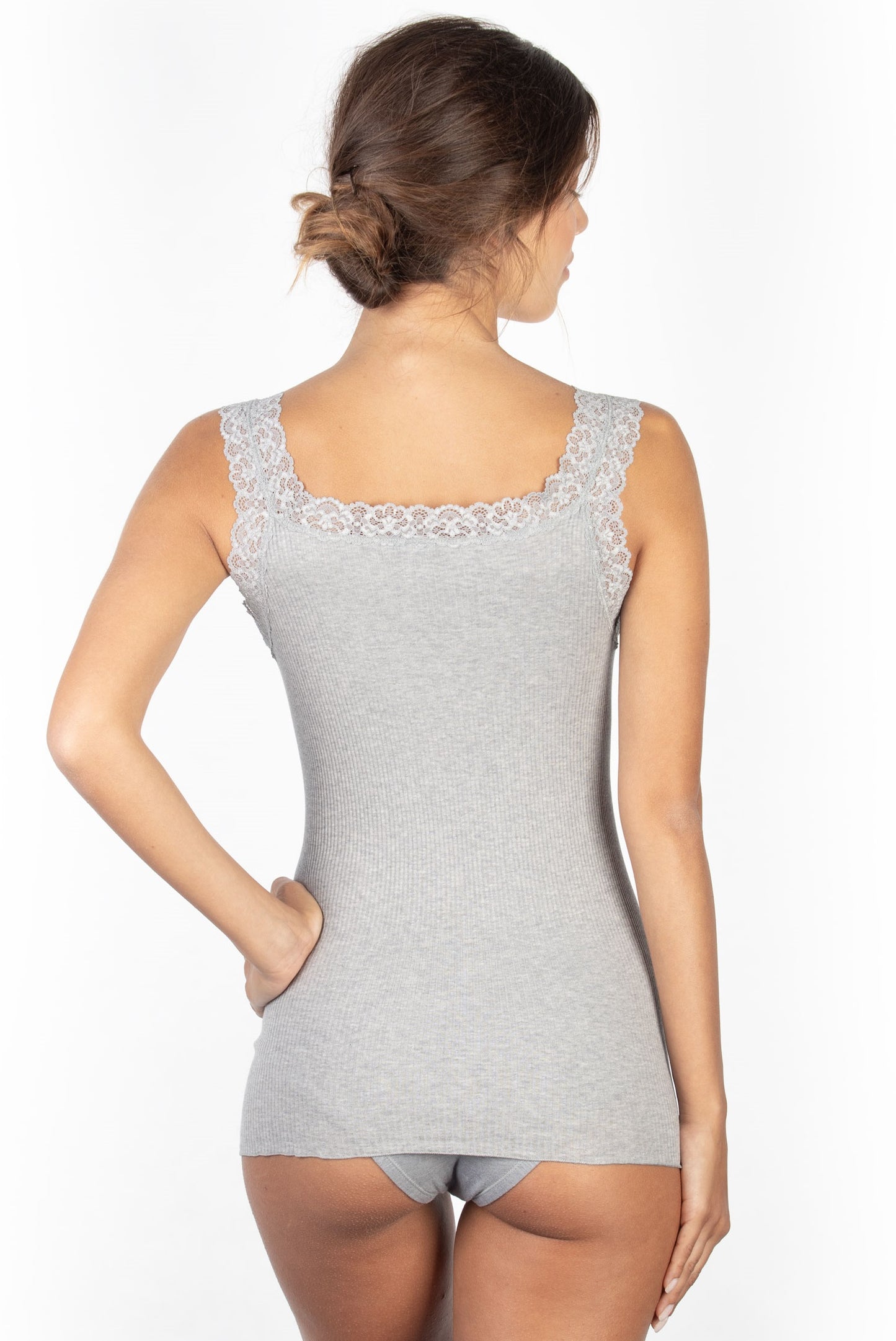 This Italian-crafted Ribbed Cotton Lace Straps Camisole is created with a lightweight cotton fabric woven with a tubular knit, providing smooth, uninterrupted sides. 