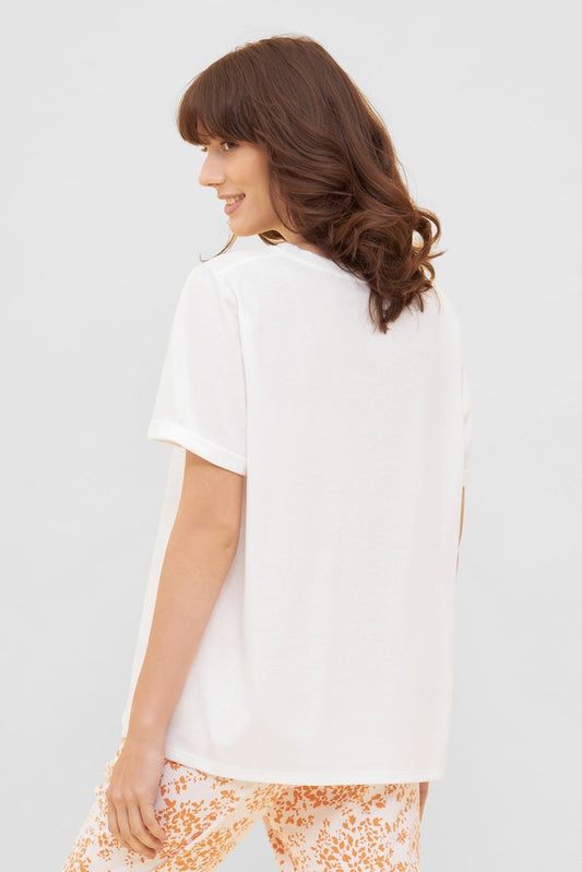 Model is wearing Be Happy Cotton T-Shirt with Animal Motif back picture with matching bottom (sold separately)