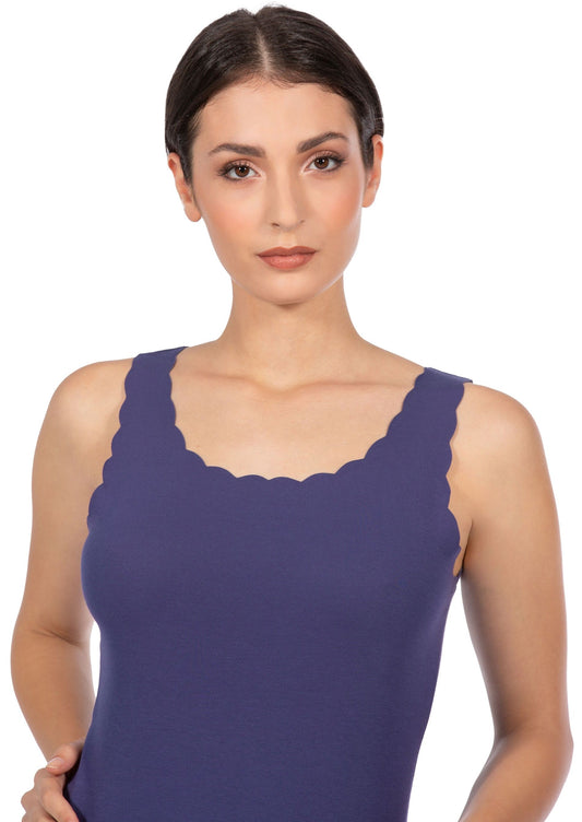 This Laser Cut Cotton Top by EGi features a smooth fabric construction and improved flexibility, making it suitable for extended wear. The scallop edges provide a refined and ornate appearance. Its thin and airy cotton fabric ensures superior coziness, and its sweat-resistant fabric technology keeps you dry for the duration.
