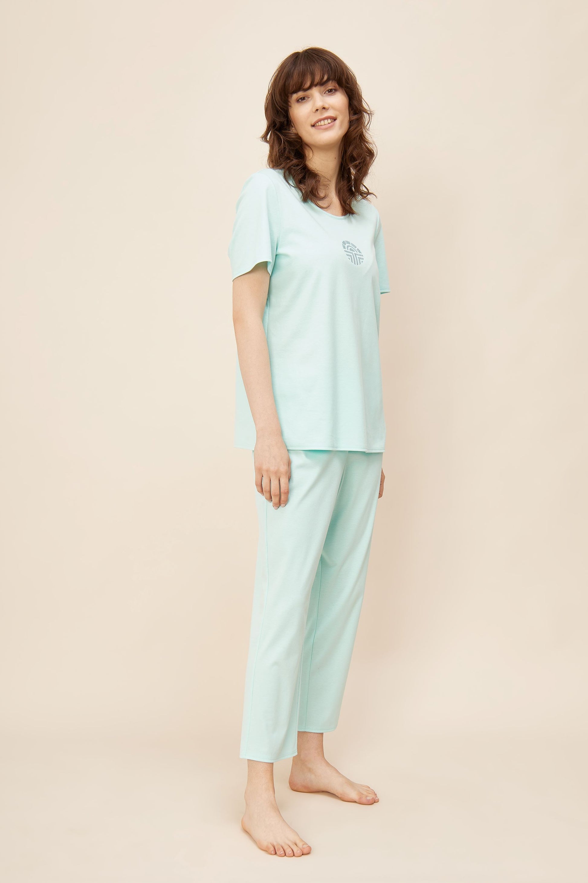 Féraud Paris' High Class line introduces this capri pajama set, crafted from 100% fine interlock cotton and adorned with Féraud logo accents on the top. 