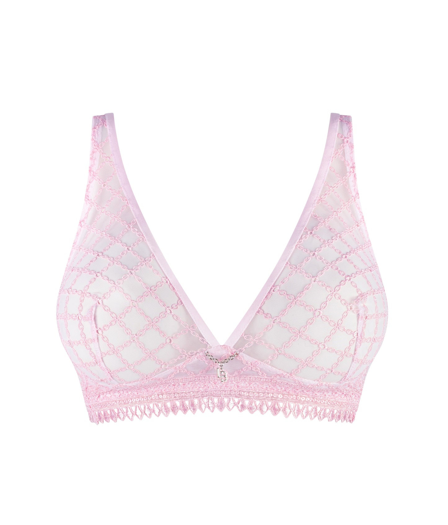 The Bralette from the Paco line showcases a captivating geometric embroidery. The intricate chain and link pattern is delicately stitched onto a sheer tulle fabric, artfully emphasizing curves and elegantly exposing the skin.