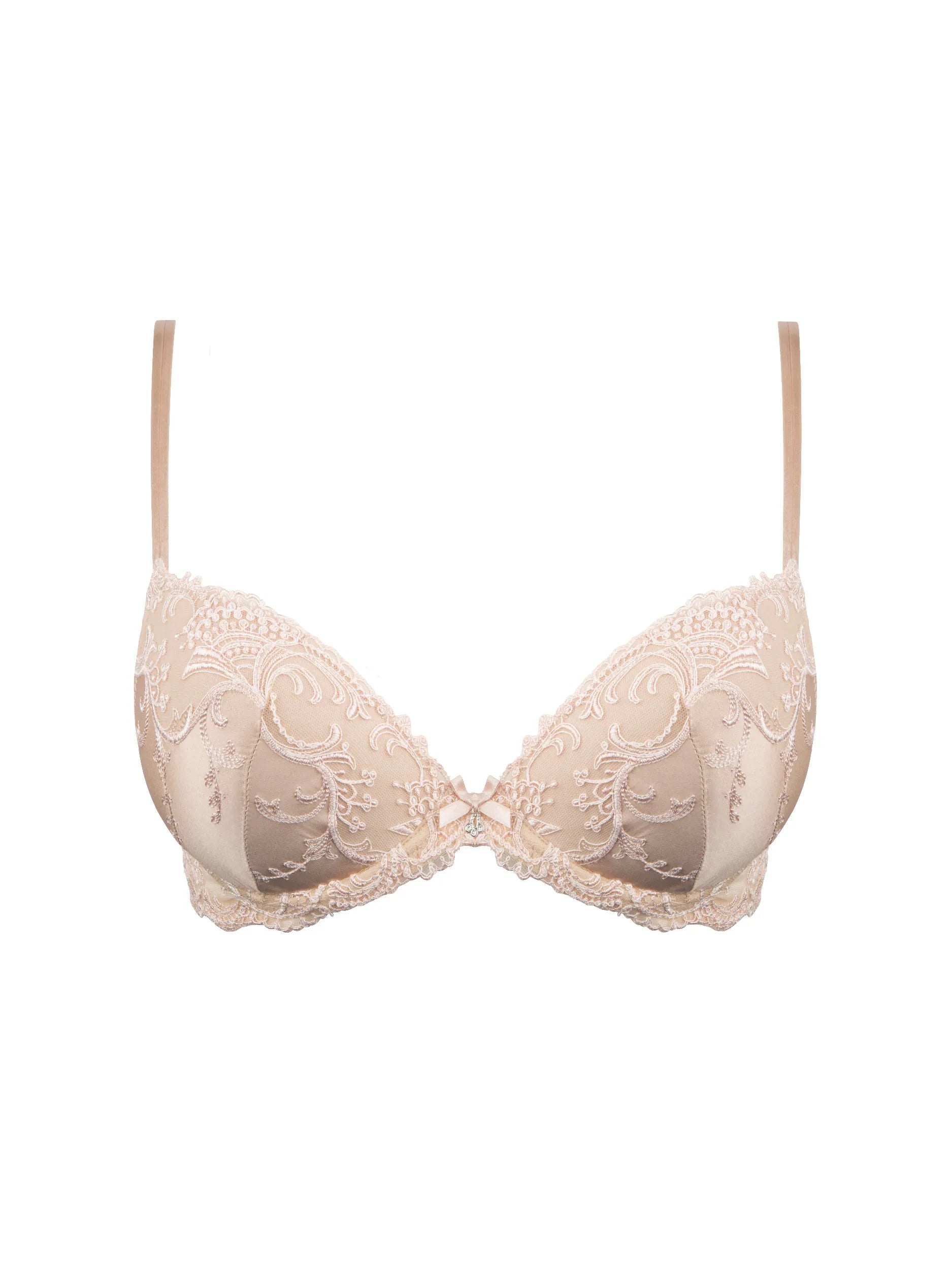 Beige bra with lace details on a white background