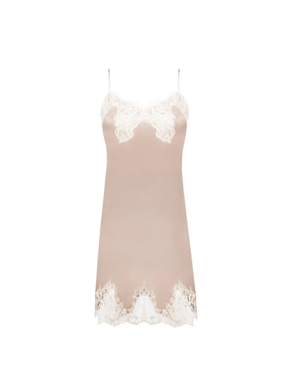 Beige slip dress with lace details on a white background