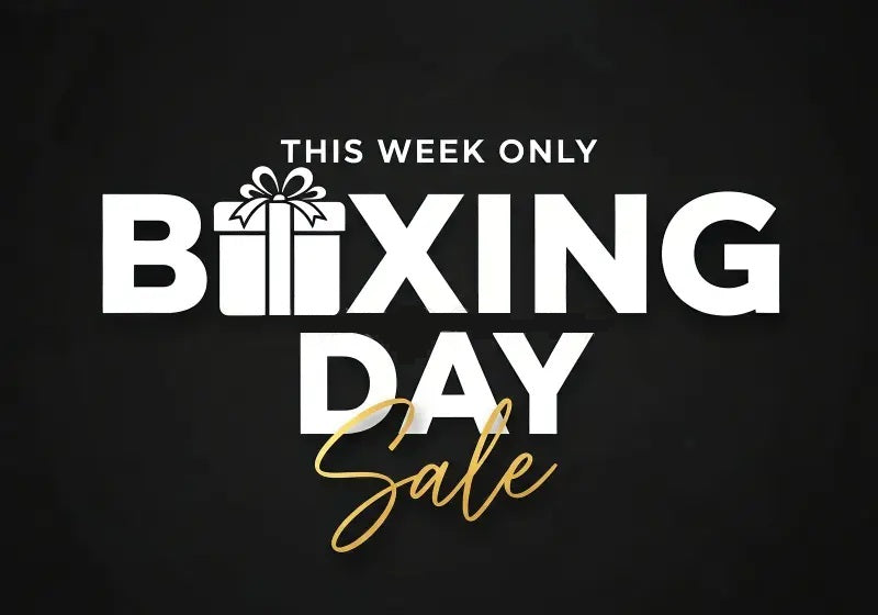Black background with white and gold text promoting a Boxing Day sale.