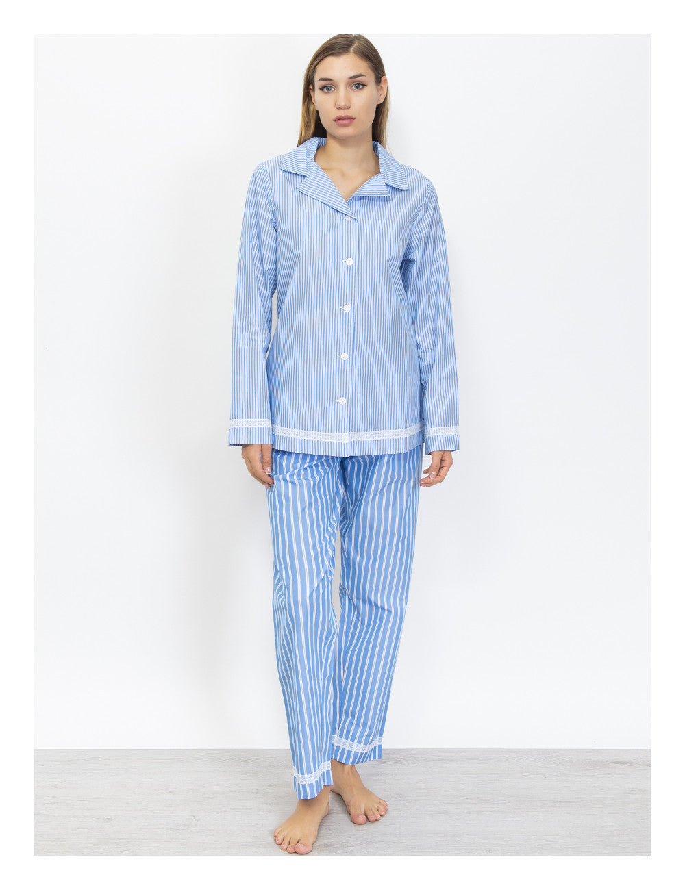 This Verdissima pajama set features a combination of male and female styling, with a button-up shirt top and long pants.