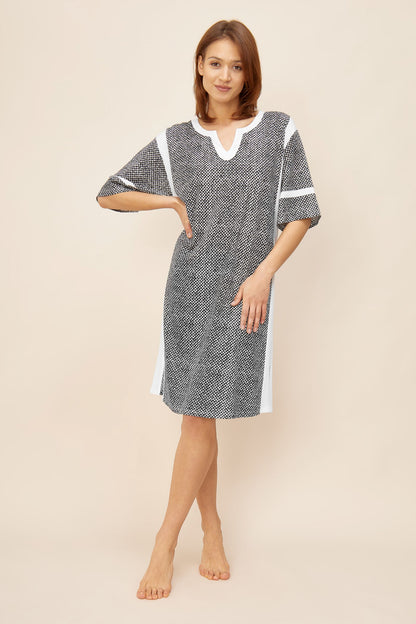 Rösch's Pure collection features a nightgown boasting an ornamental dots print and a fabric blend of cotton and modal for utmost comfort.