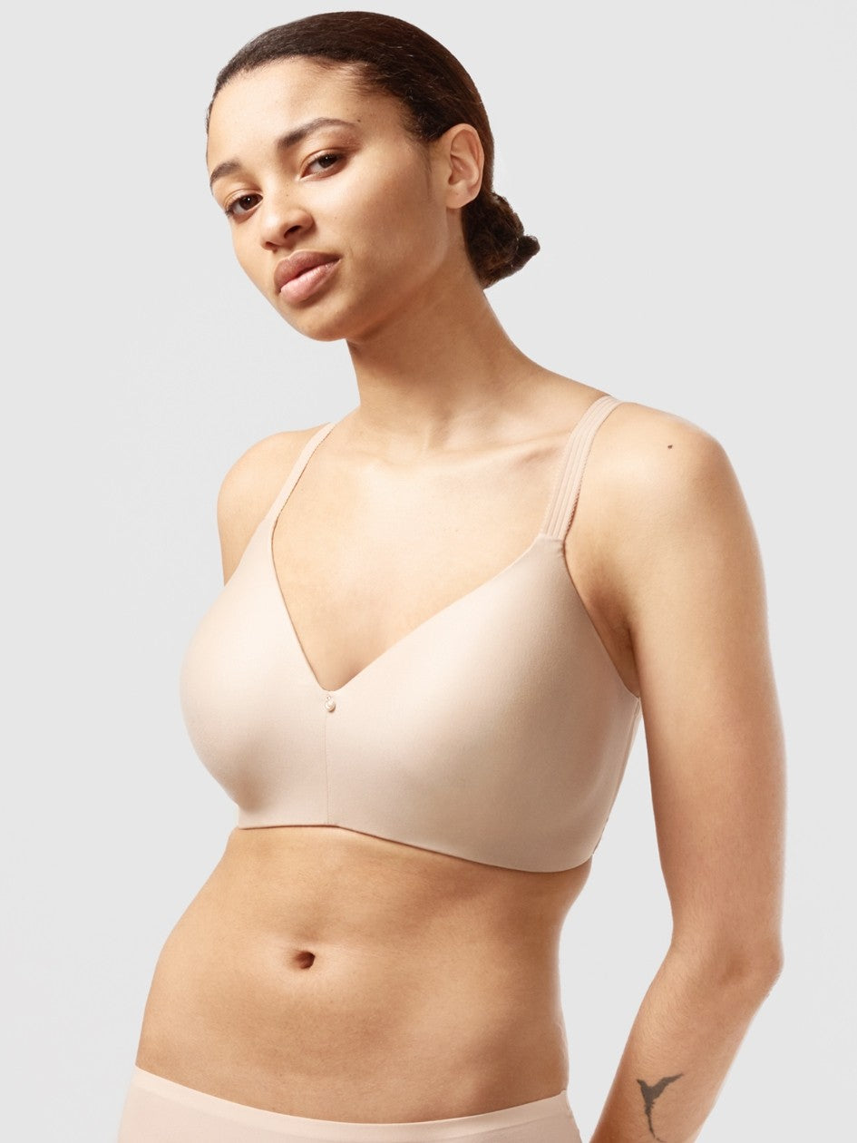 This wire-free option from the C Comfort line of bras by Chantelle is designed to provide coverage and support with lightweight, flexible cups that will create a smooth, t-shirt look without wrinkling or bulging. Constructed with a soft, brushed knit fabric, it will have the sensation of wearing a "second skin". Double lined band smooths back, hugs securely for all-day lift and comfort.