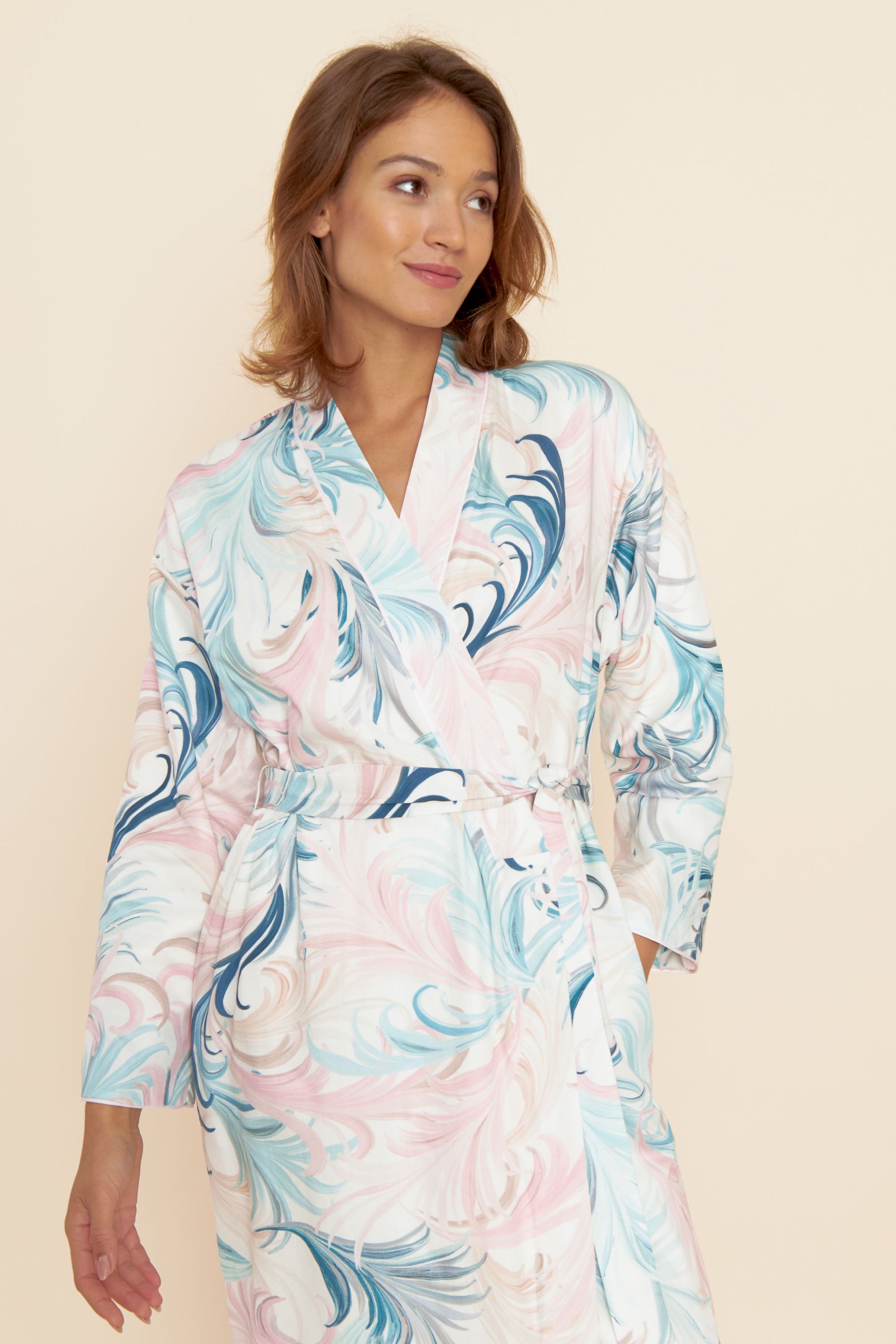 The High Class line from Féraud Paris offers a luxurious kimono-styled robe with cotton satin and terrycloth lining, featuring a romantic feather pattern.