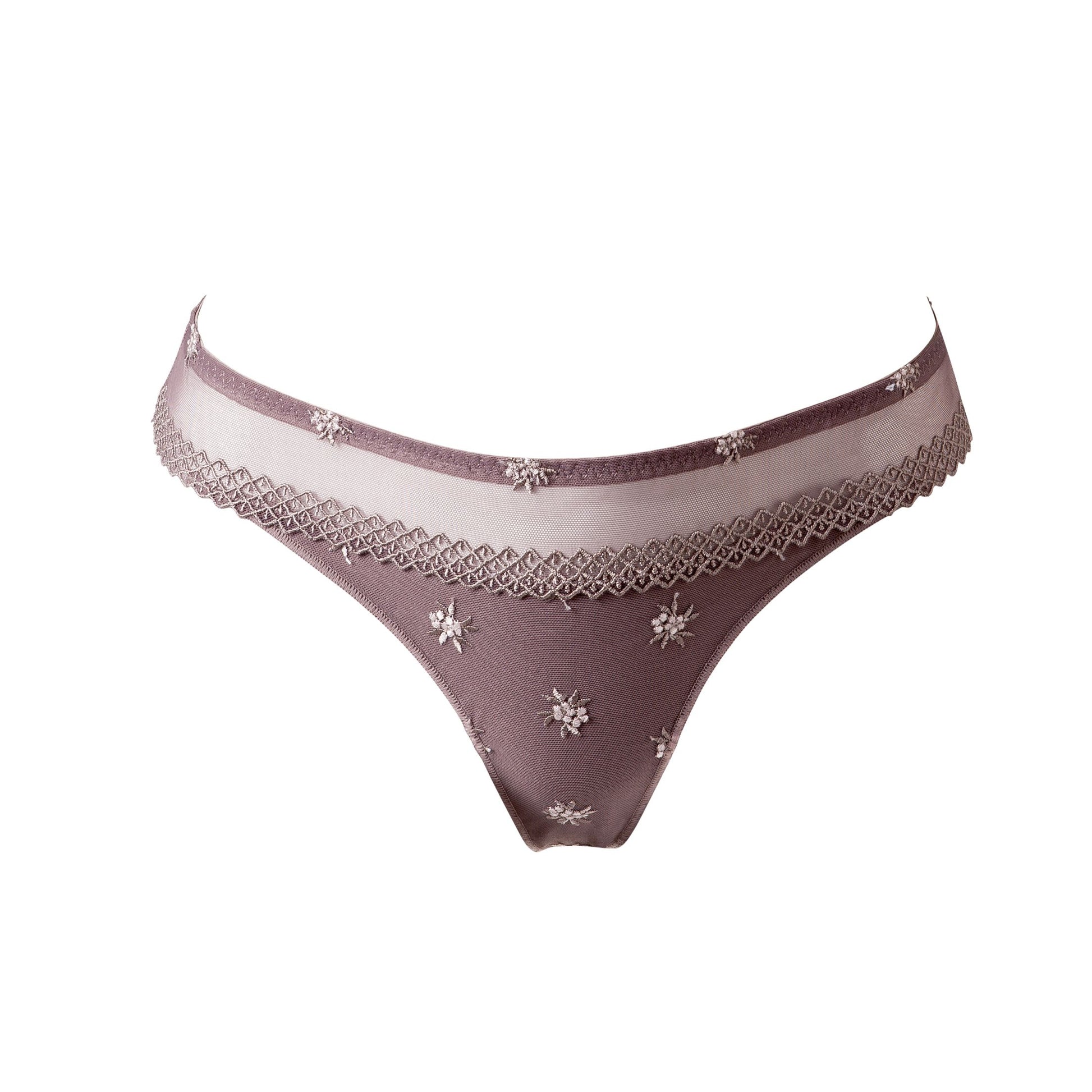 The Chantilly line by Louisa Bracq thong features a geometric border-line complemented by shimmering iridescent medallions, providing a sophisticated and refined air. 