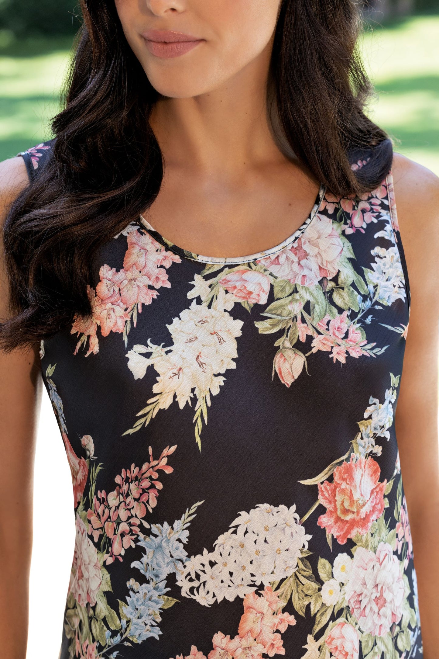 This top is inspired by the gardens of Positano in Italy and provides a comfortable fit and sophisticated aesthetic. Its floral detailing and subtle colors create a unique look while its silky fabric ensures trustworthy quality. This versatile garment is suitable for wear as an outfit top, sleepwear, or loungewear.
